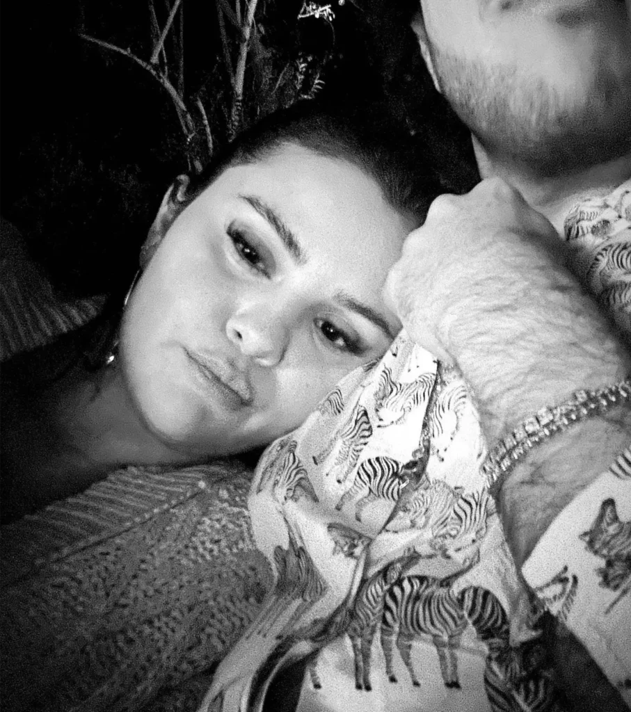 Selena Gomez revealed the couple had been together for six months while clapping back at an internet troll.

