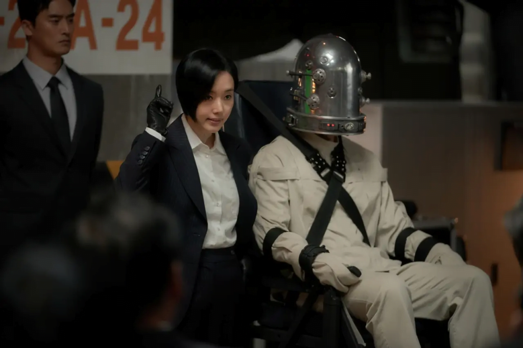 Meanwhile, a specialized task force known as "Team Grey" has been mobilized to combat the parasitic threat, under the leadership of Choi Jun-kyung. Parasite the grey